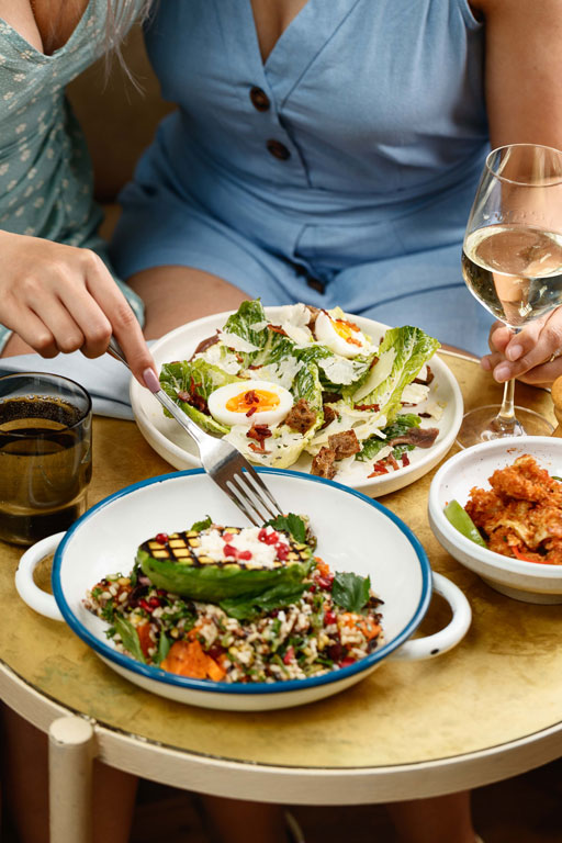 Customers Eating Food on Buther & Farmer Restaurant